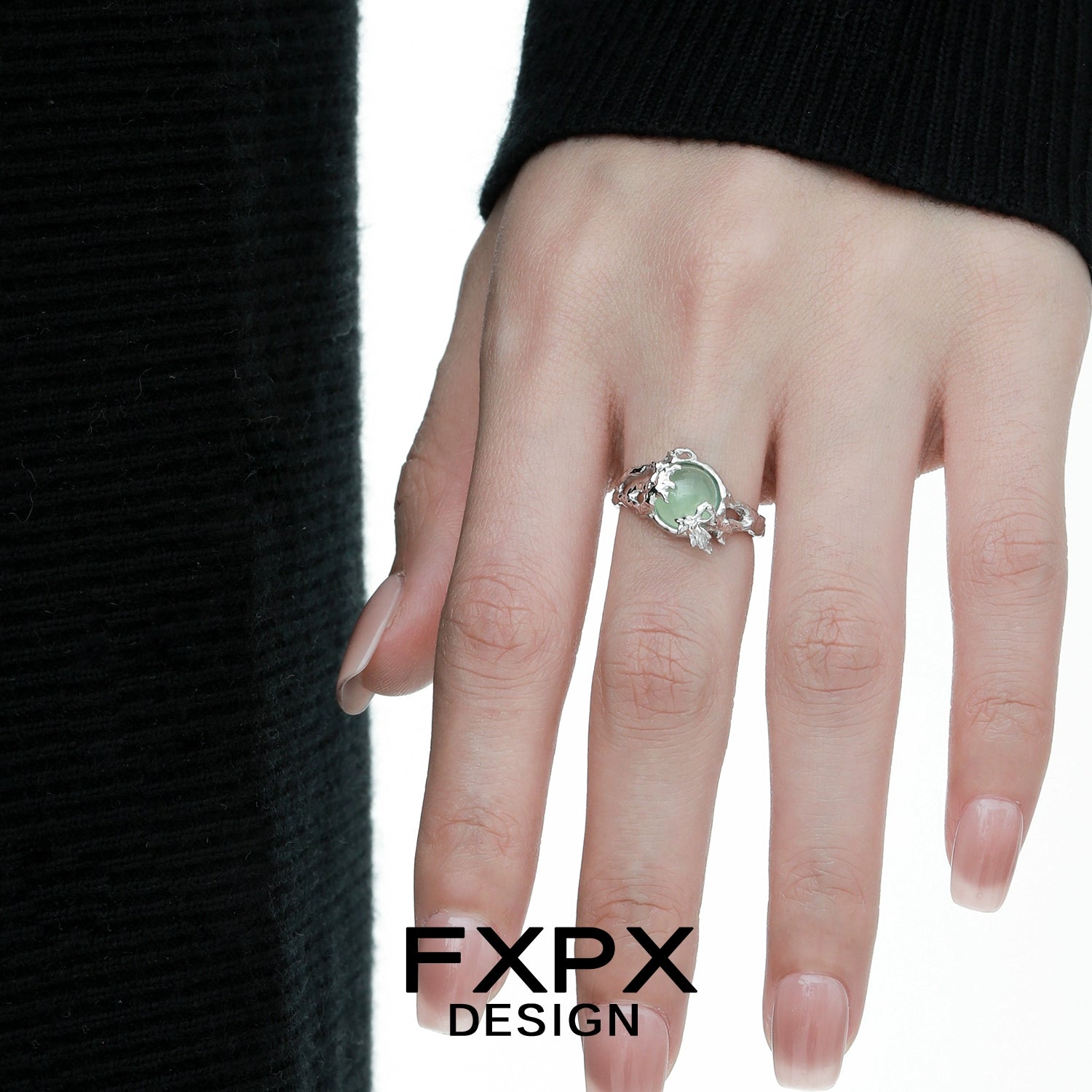 Elegant FXPX eagle claw gemstone ring set with a beautiful green stone for a unique look