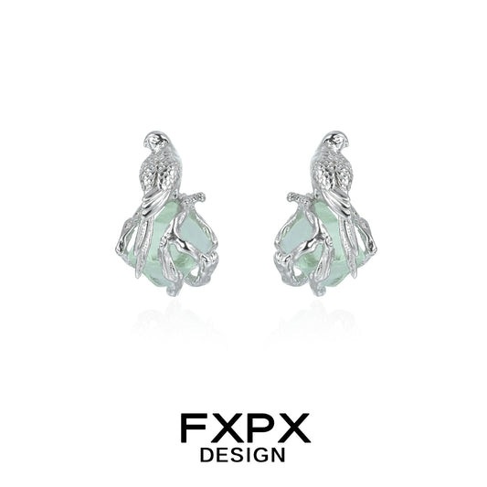 Silver FXPX flying bird fluorite earrings with detailed bird design and elegant gemstone setting