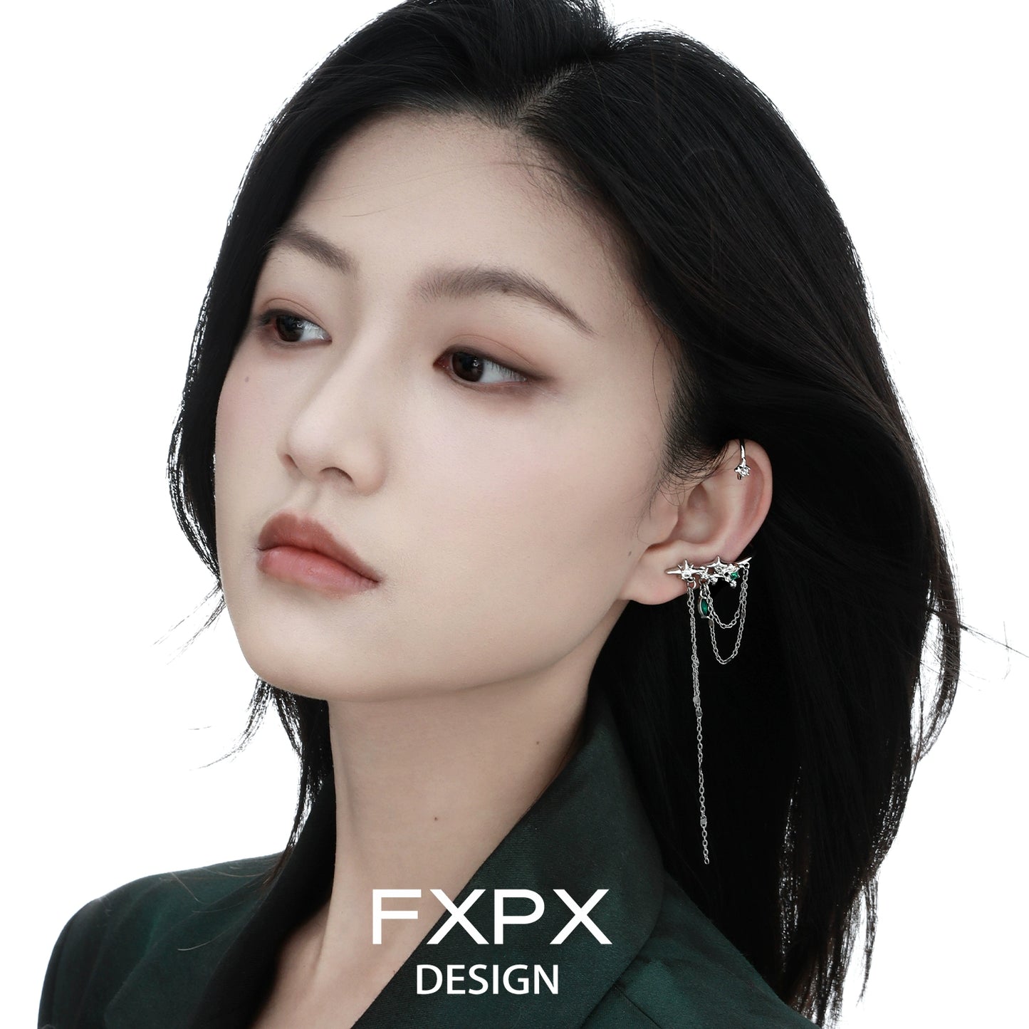 Elegant model wearing FXPX forest star ear cuff with delicate chain detail for a stylish look