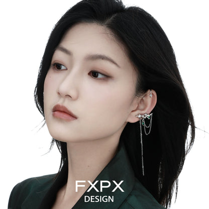 Elegant model wearing FXPX forest star ear cuff with delicate chain detail for a stylish look