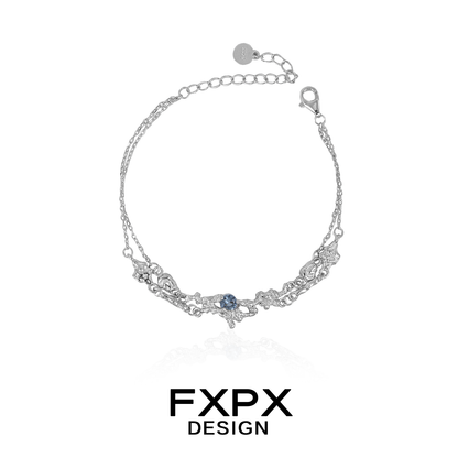 Delicate FXPX frost blue zircon bracelet with intricate silver design and adjustable chain closure