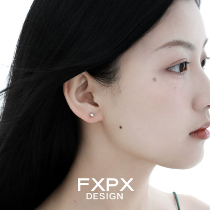 Elegant frosted white agate stud earrings showcased on model's ear for a stylish look