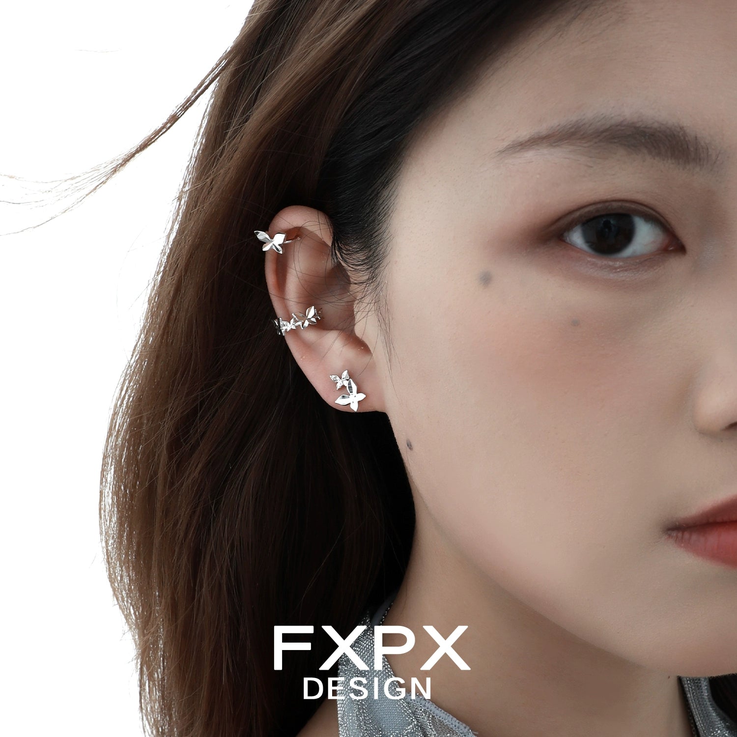 FXPX futuristic butterfly ear cuff showcasing a stylish design worn on the ear