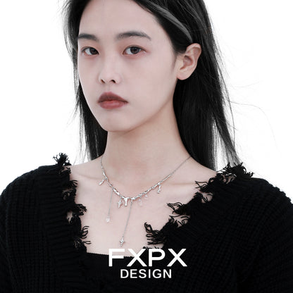 FXPX Galactic Meteor Tassel Necklace featuring shimmering tassels and a modern design.