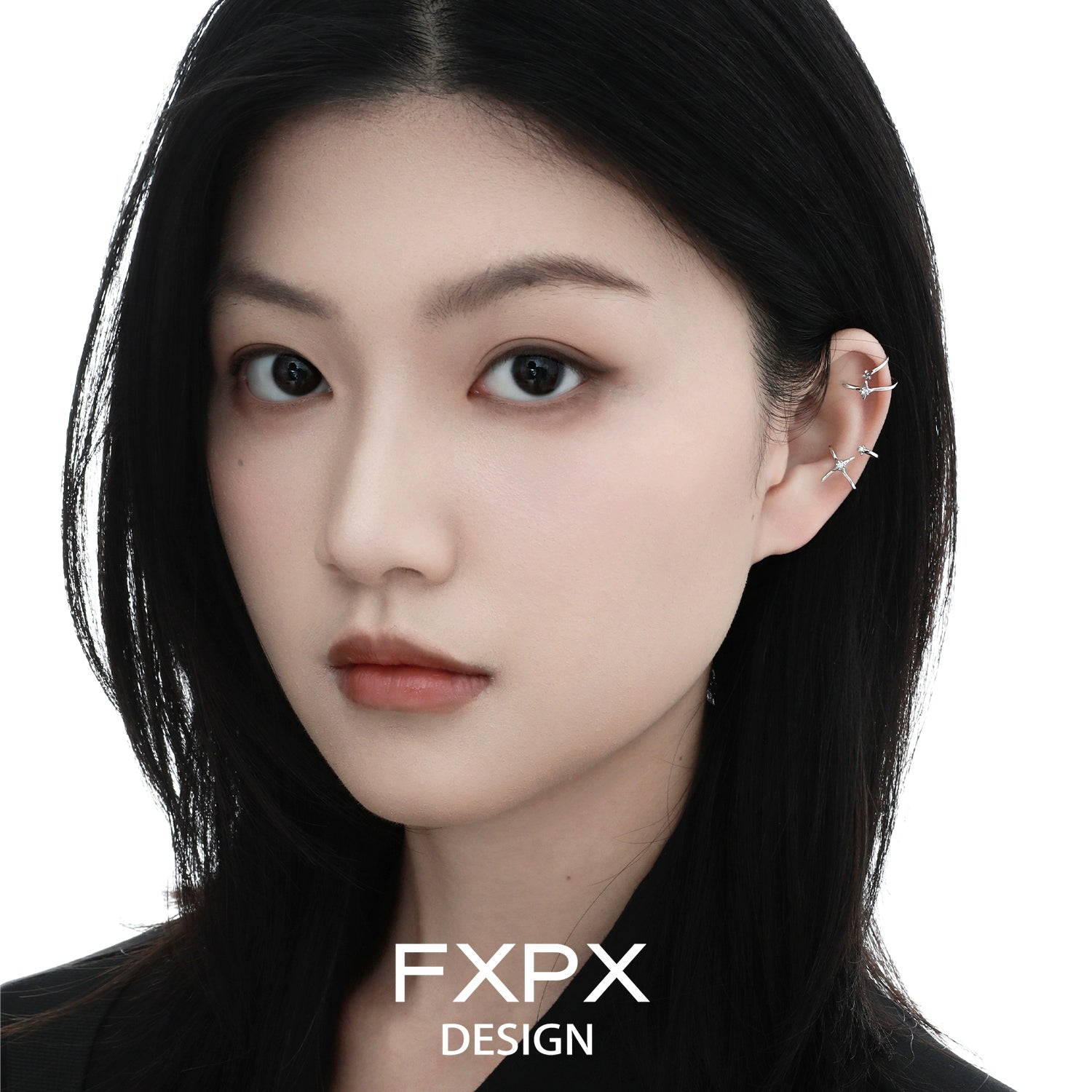 FXPX geometric orbit ear clip worn by a model showcasing unique design and modern aesthetics
