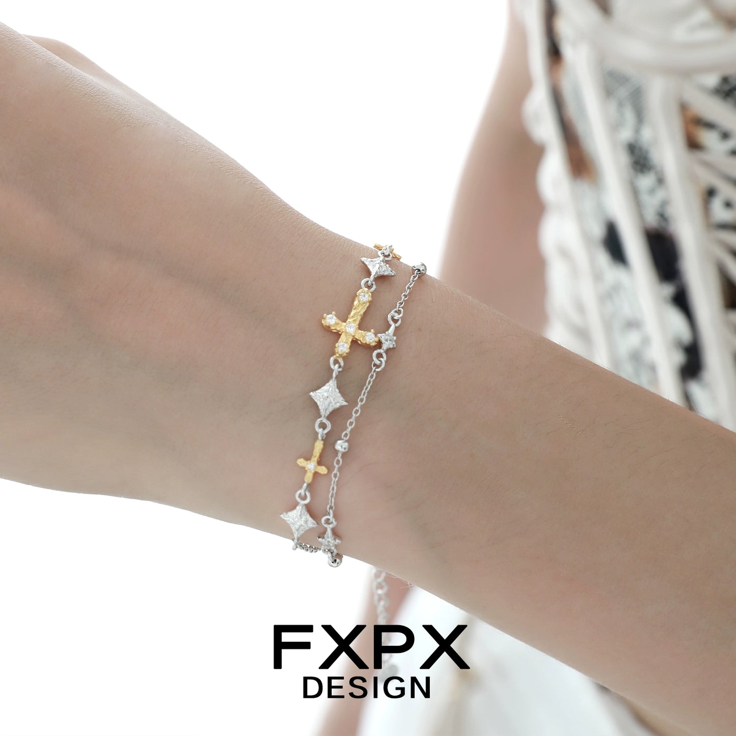 Elegant gold cross silver bracelet with delicate charms and adjustable length for stylish accessorizing
