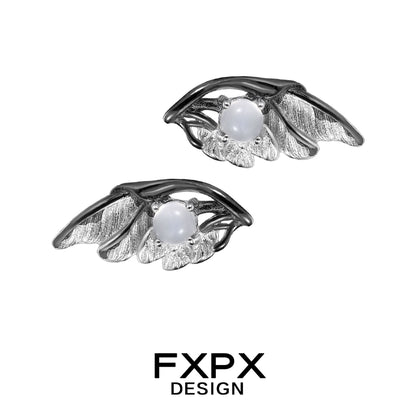 FXPX gothic angel wing earrings with intricate leaf design and a pearl accent