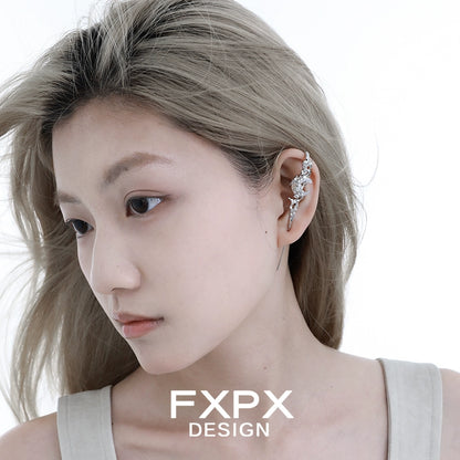 Elegant FXPX gothic ear needle jewelry showcasing intricate design and modern style on a model