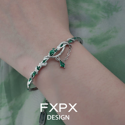 FXPX gothic rose snake bracelet featuring intricate design with green accents on a silver chain