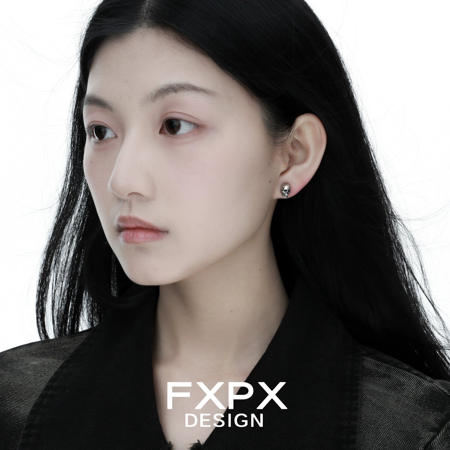 FXPX Gothic Skull Silver Earrings showcased on model with long black hair and minimalist style