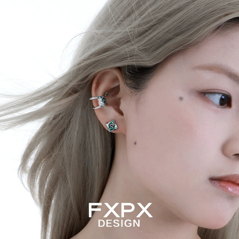 Stylish green snake earrings by FXPX, perfect for adding a unique touch to your outfit