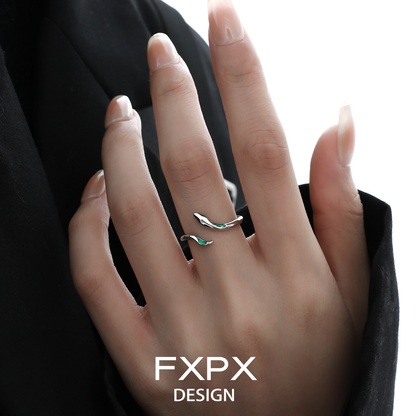 Stylish FXPX green snake ring for women featuring a unique design on a hand model