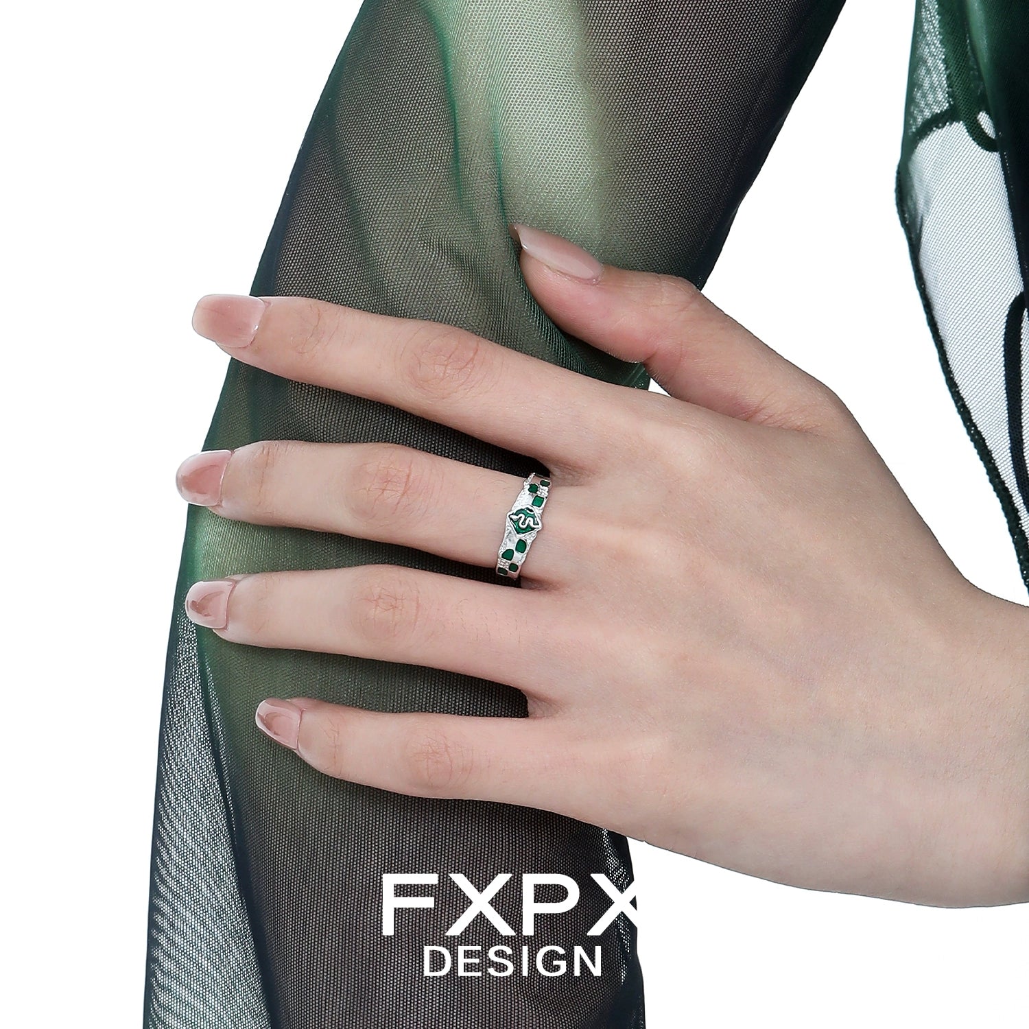 Elegant FXPX green snake ring featuring intricate design details worn on a model's hand