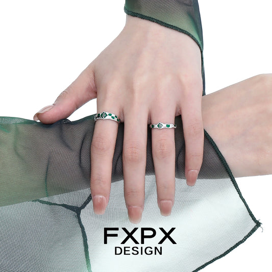 FXPX Silver Green Snake Ring with Emerald Green Accents on Hand with Sheer Green Fabric