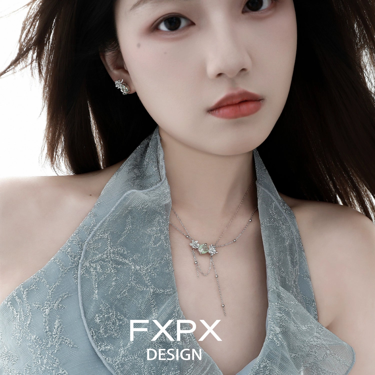 FXPX green zircon double layer necklace worn by model with elegant hairstyle and stylish outfit