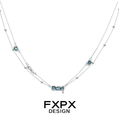Stunning FXPX Icelandic blue zircon necklace with elegant silver detailing and multiple gemstone accents