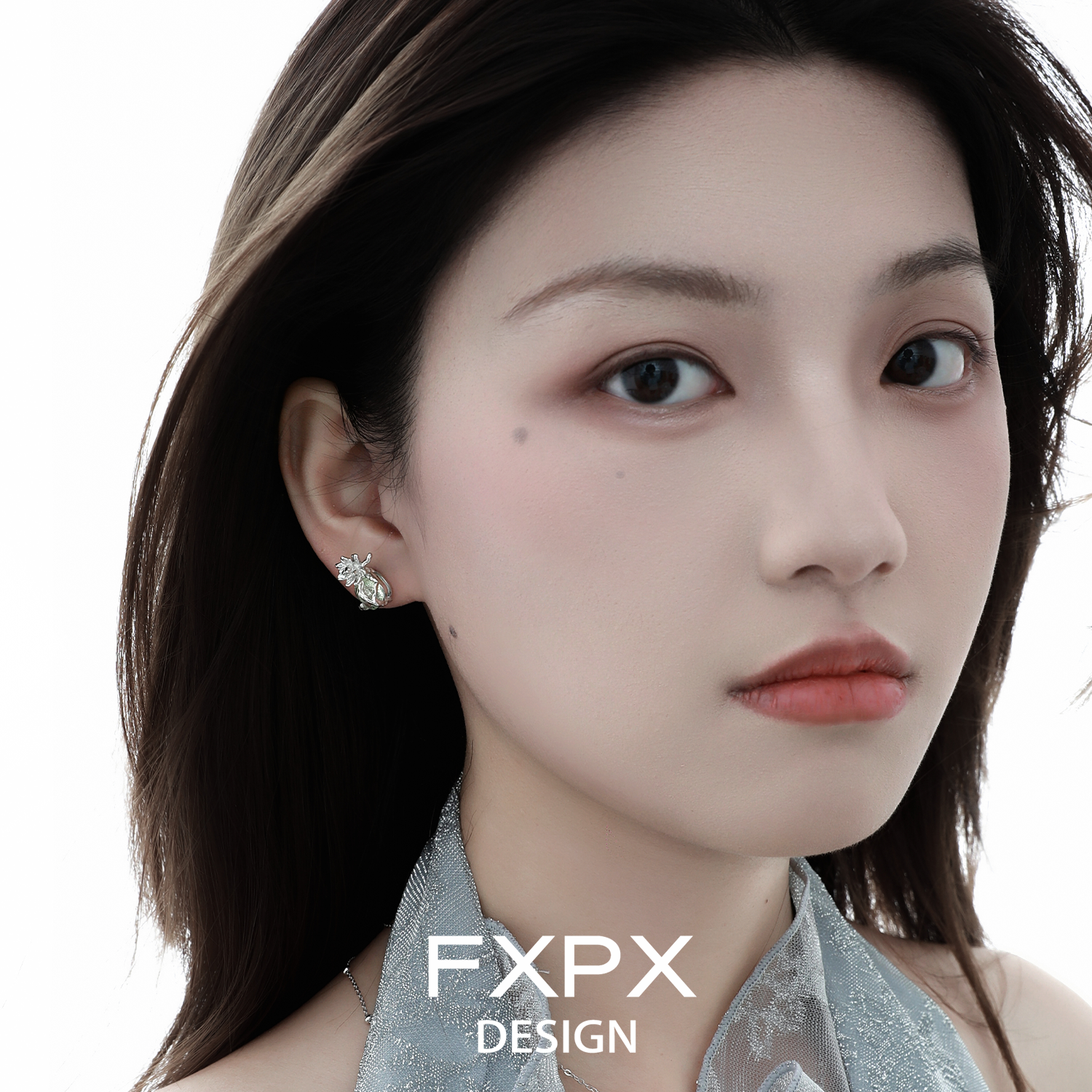 Stylish FXPX jasmine green zircon earrings worn by a model for a chic look