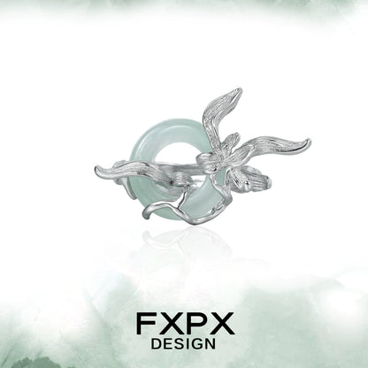 FXPX lake iris silver ring featuring an intricate floral design with a greenish stone