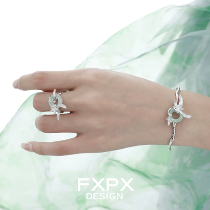 FXPX lake iris silver ring featuring a delicate floral design for elegant style.