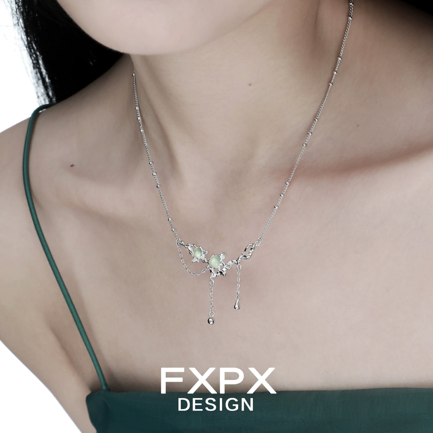 Elegant FXPX lotus pendant necklace featuring floral design and delicate chain detail