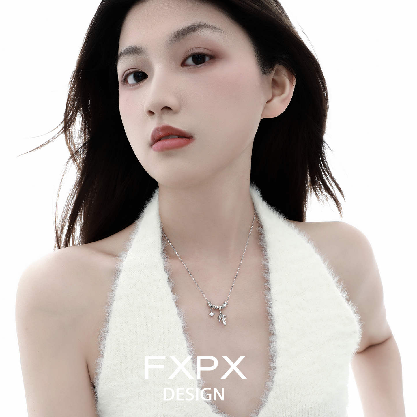 Stylish model wearing a delicate metal mushroom necklace from FXPX Jewelry collection