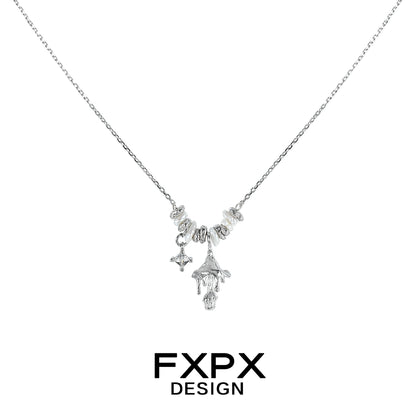 FXPX metal mushroom necklace featuring intricate designs on a silver chain for modern style