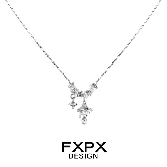FXPX metal mushroom necklace featuring intricate designs on a silver chain for modern style