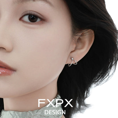 Stylish FXPX meteor silver earrings showcased on a model's ear for a modern look