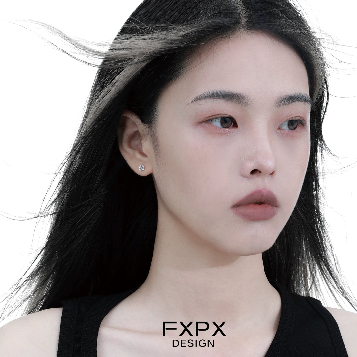 Model wearing minimal rose silver earrings, showcasing elegant and simple design for everyday wear