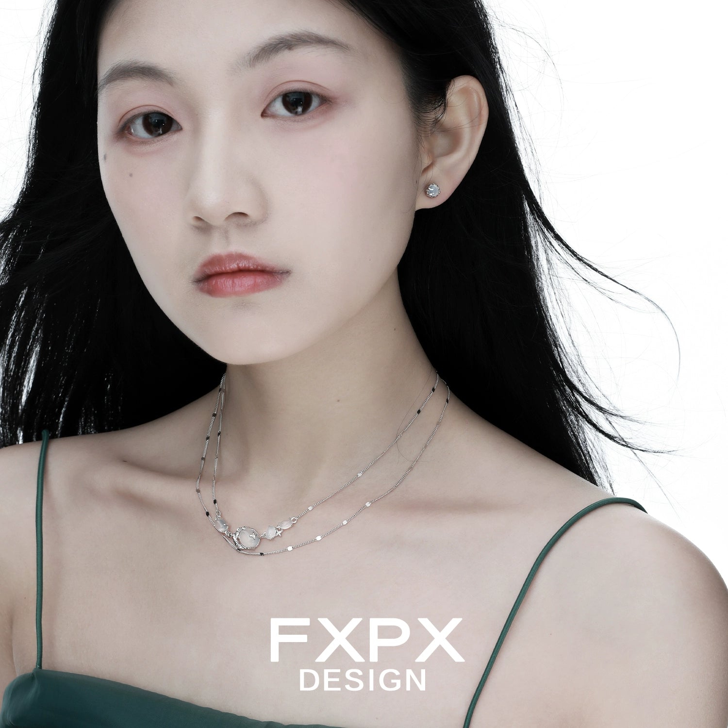 Minimalist agate necklace worn by a model with long hair, showcasing a simple and elegant design