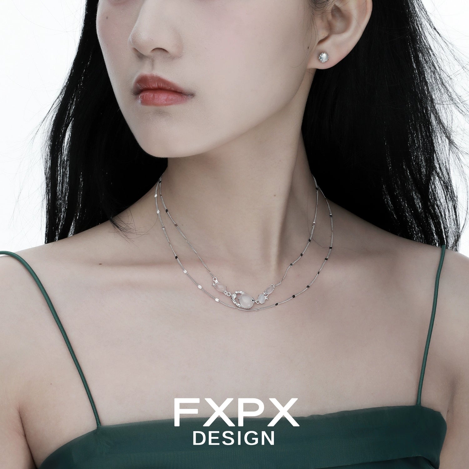 Elegant minimalist agate necklace layered with delicate silver chain for a chic look