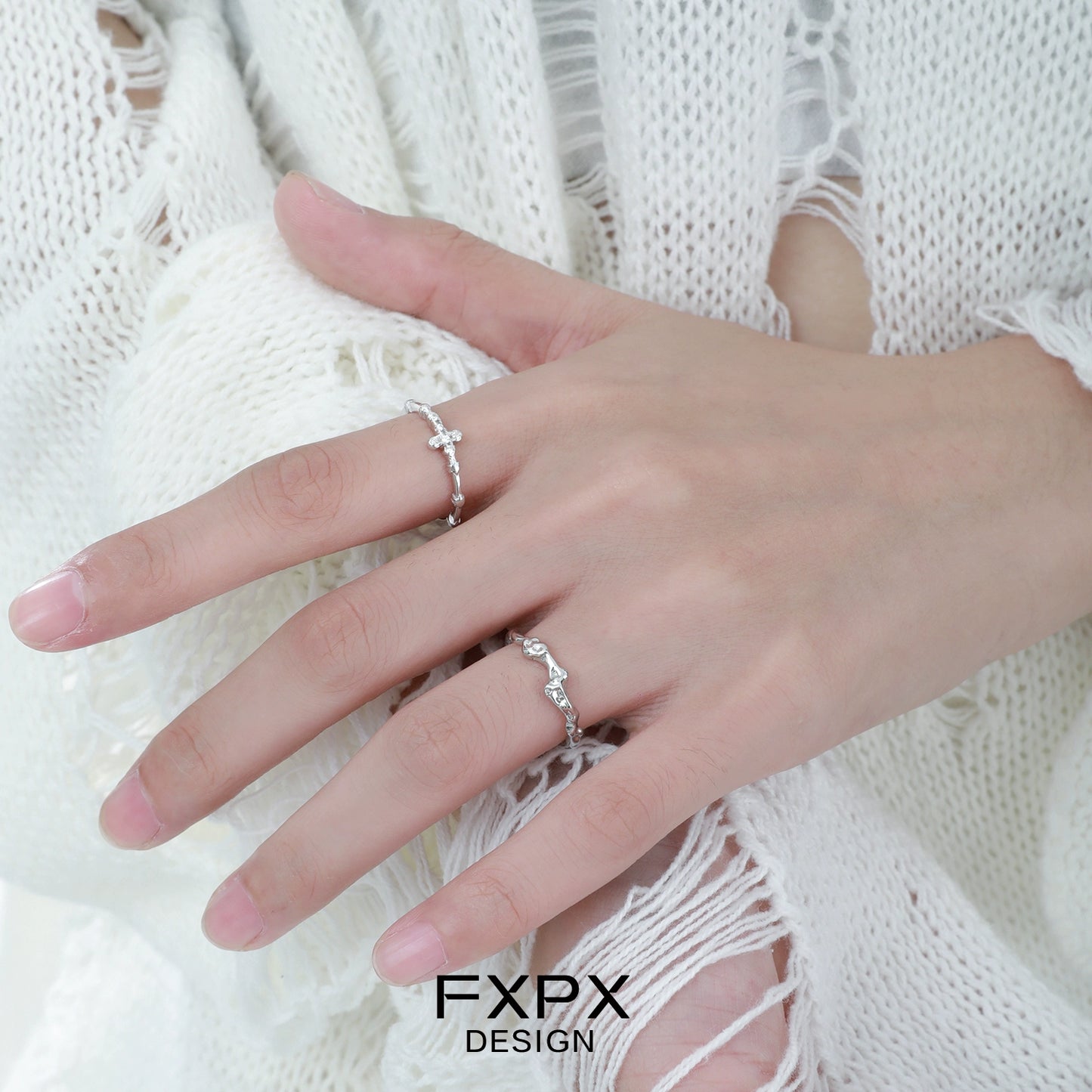 Stylish FXPX minimalist cross silver ring showcasing a delicate design on a hand