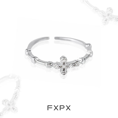 Elegant minimalist cross silver ring from FXPX with a delicate design and sparkling accents