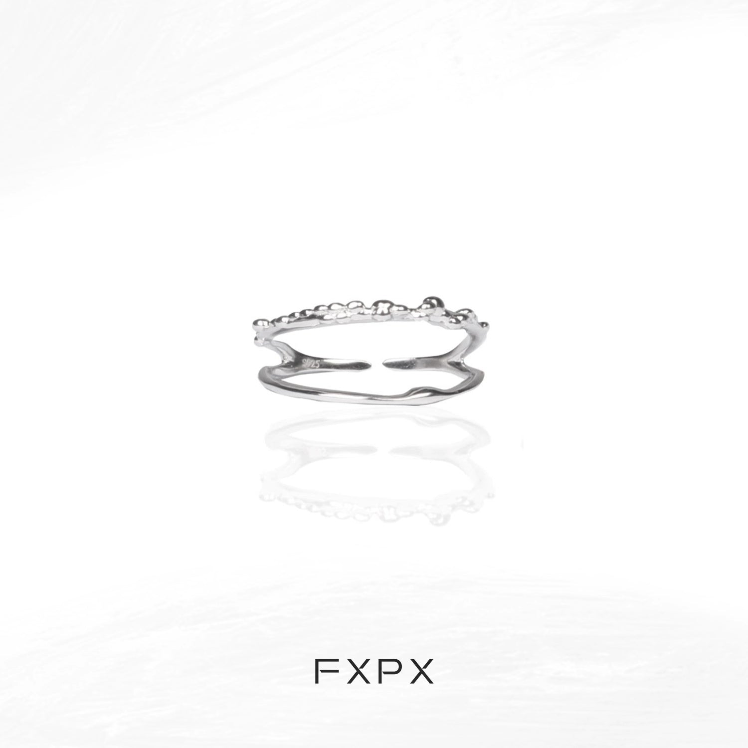 Stylish minimalist double layer ring in silver perfect for everyday wear and layering with other rings