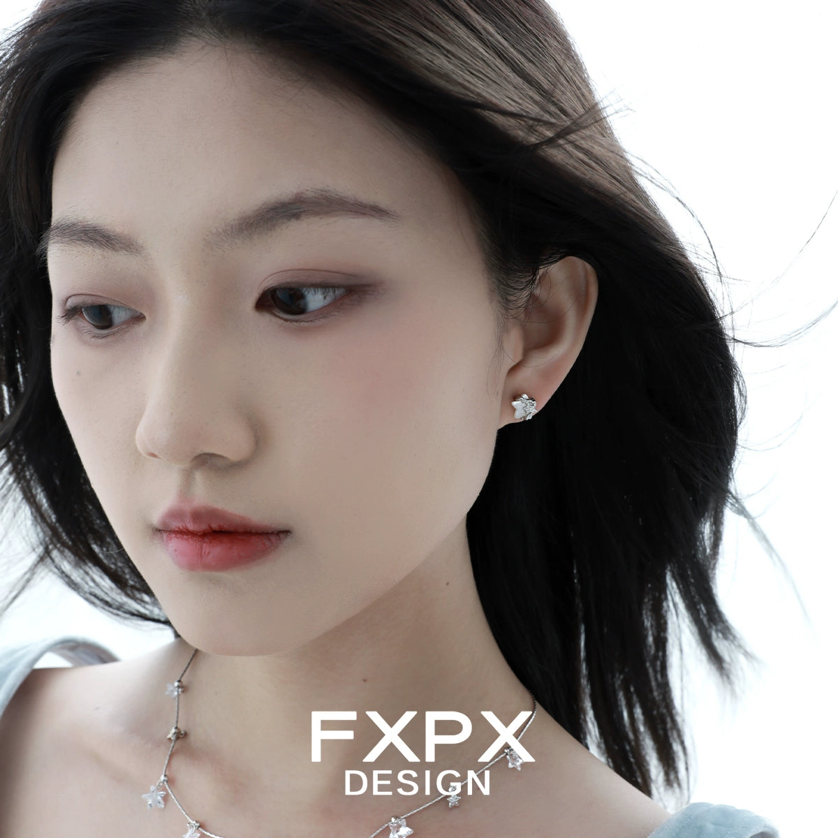 Elegant minimalist star shell earrings by FXPX, perfect for casual and formal occasions