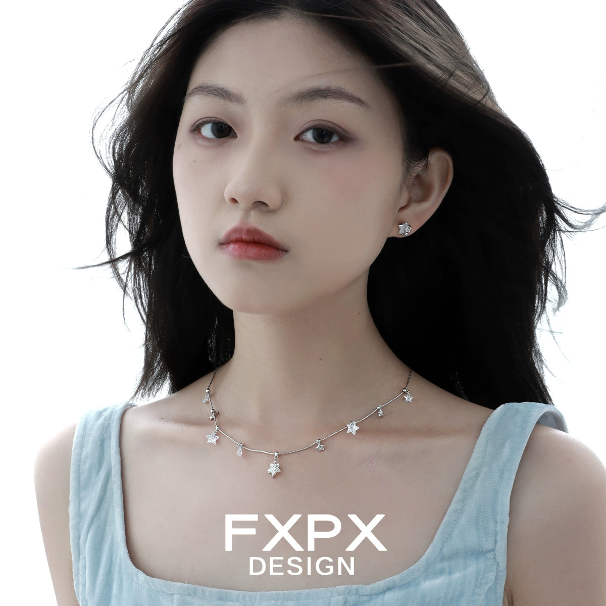 Minimalist star shell earrings by FXPX, featuring a simple and elegant design suitable for any occasion