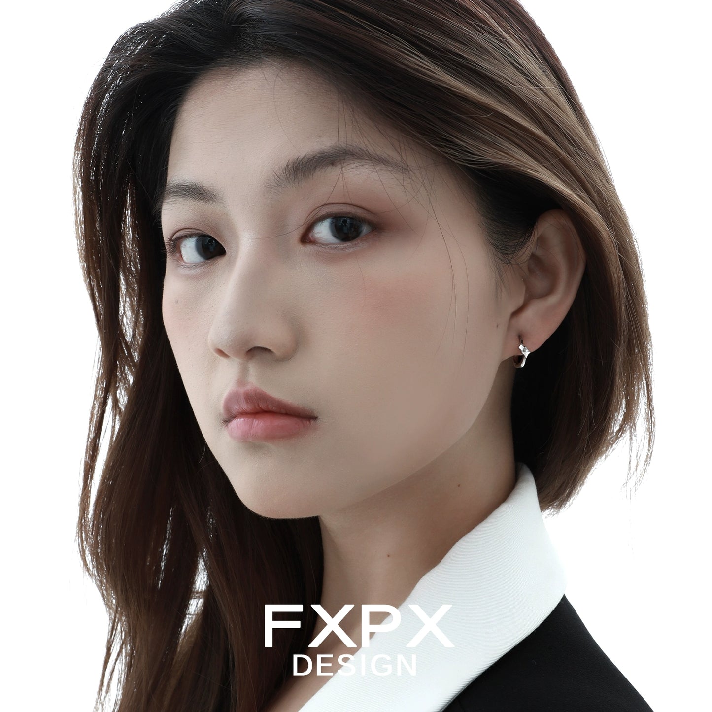 Model wearing mirror square silver earrings for a stylish and modern look