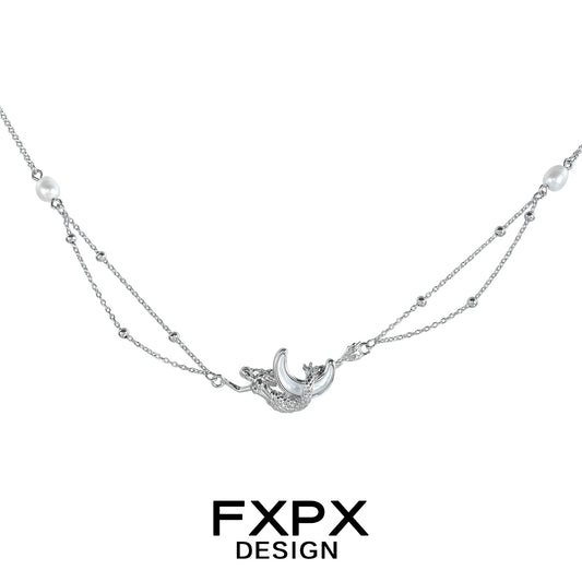FXPX moon shell necklace in silver with delicate pearls and intricate design