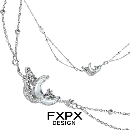 FXPX moon shell necklace featuring a silver design with intricate details and a unique crescent shape