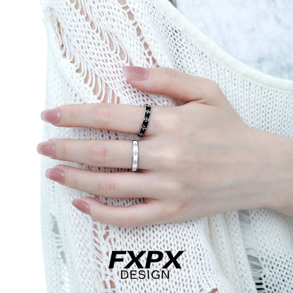 Stylish FXPX mystery couple rings on a hand with a black and white design for matching pairs