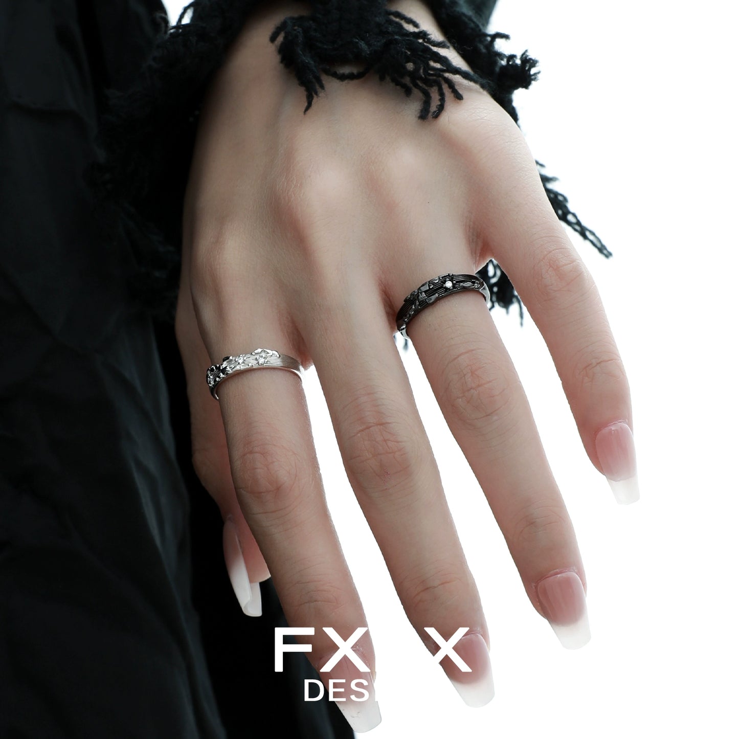 Stylish FXPX mystic map couple rings in silver and black designs, perfect for partners