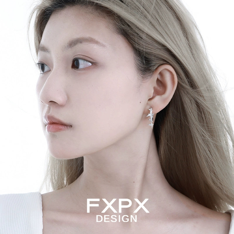 FXPX punk butterfly earrings in silver, showcasing a unique design for trendy fashion lovers