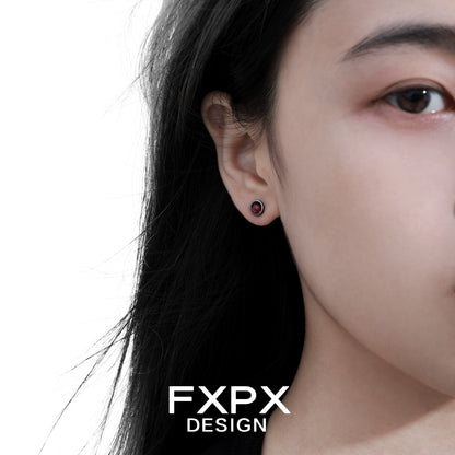 Elegant FXPX punk crystal stud earrings displayed on a model's ear for a trendy look