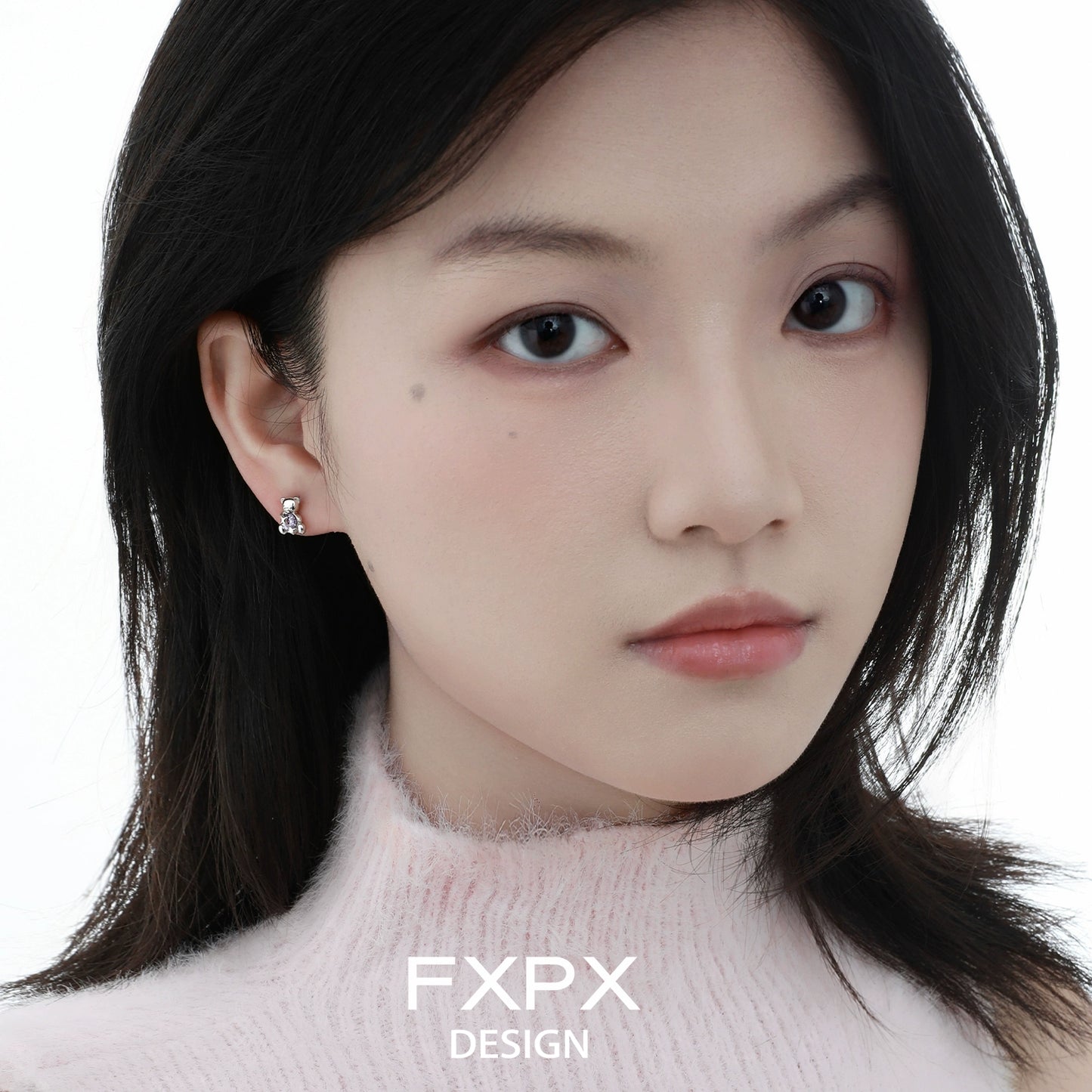FXPX purple bear stud earrings on model, featuring a cute and playful design for stylish accessories