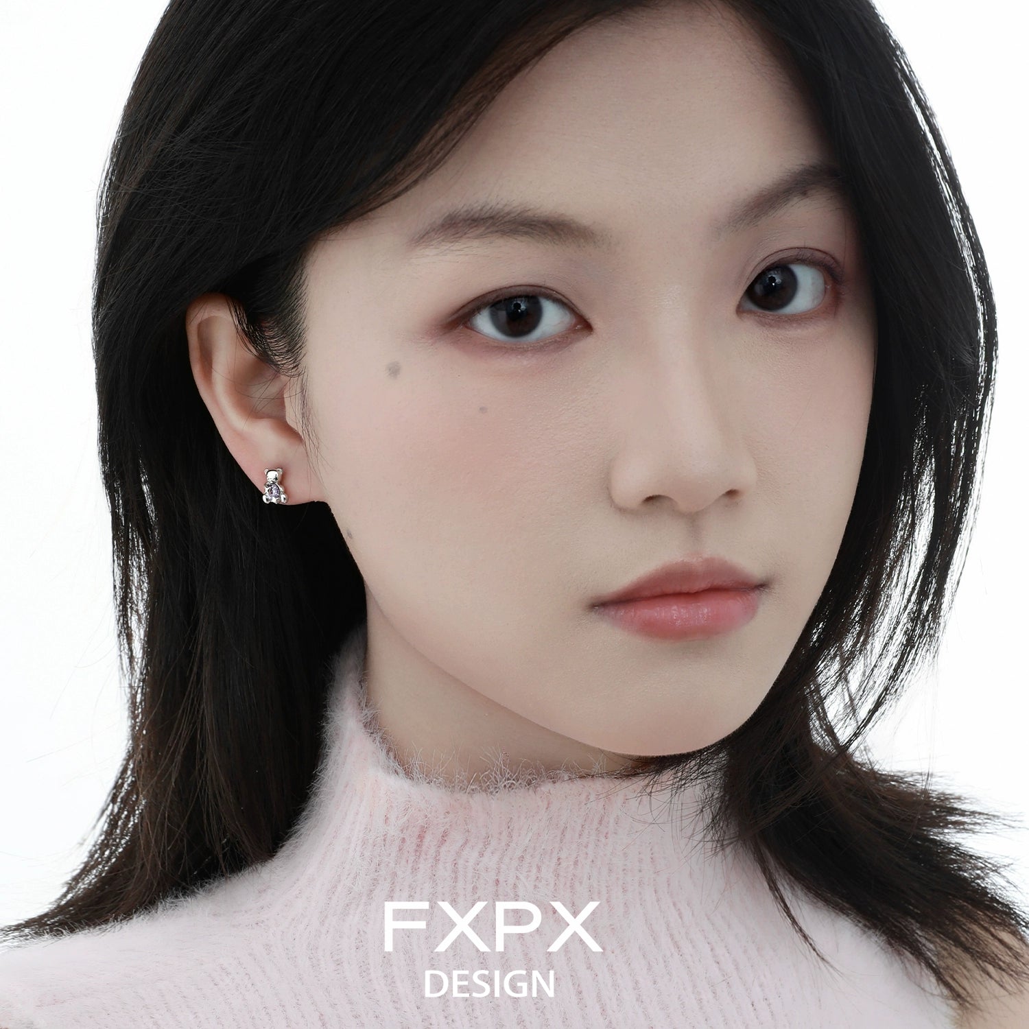 FXPX purple bear stud earrings on model, featuring a cute and playful design for stylish accessories