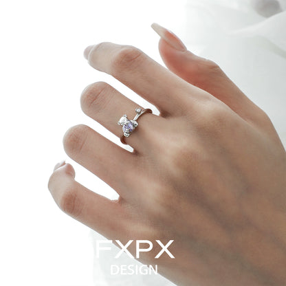 Elegant FXPX purple zircon bear ring shown on a hand, perfect for stylish accessories