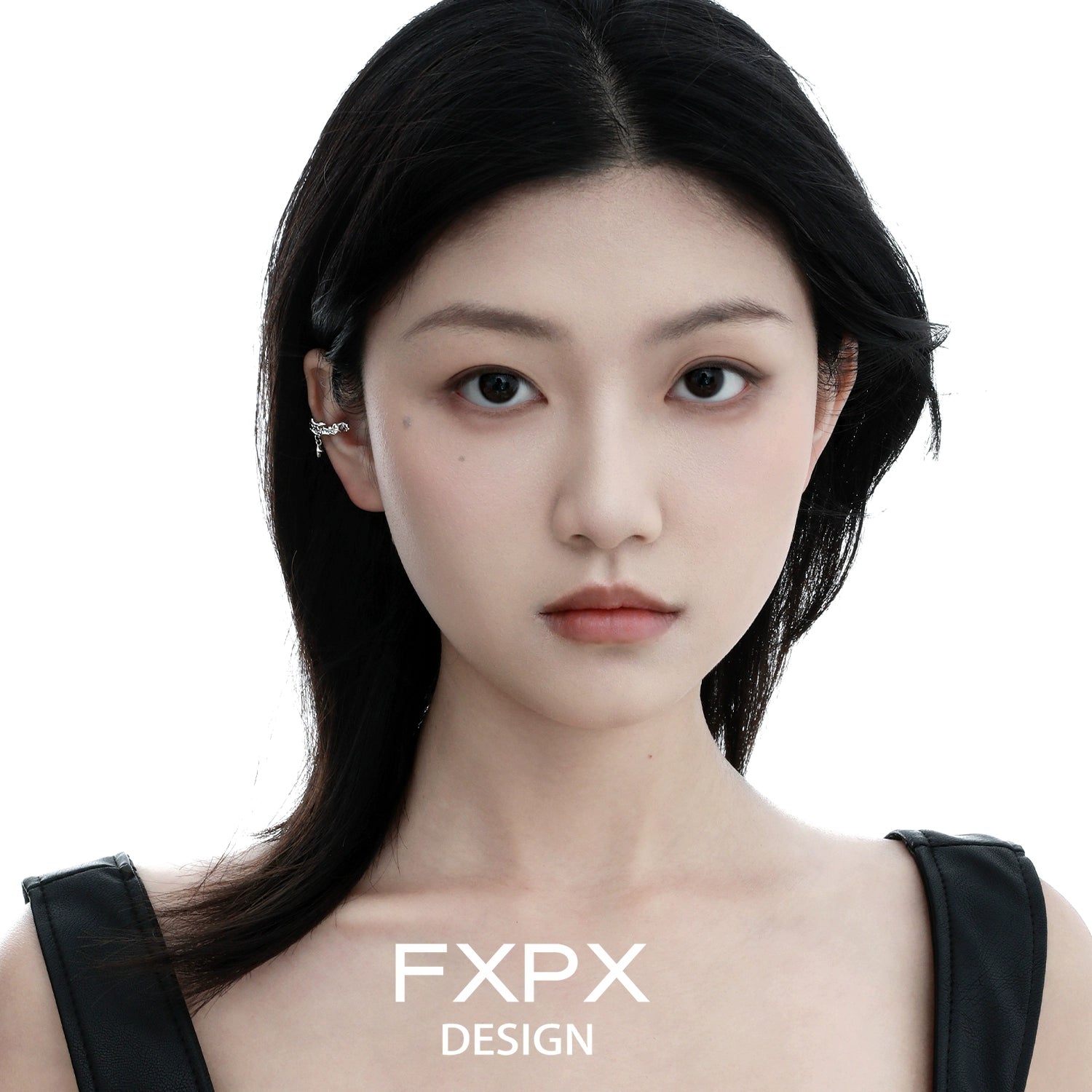 Stylish FXPX red zircon ear clips showcased on a model's ear for a trendy look