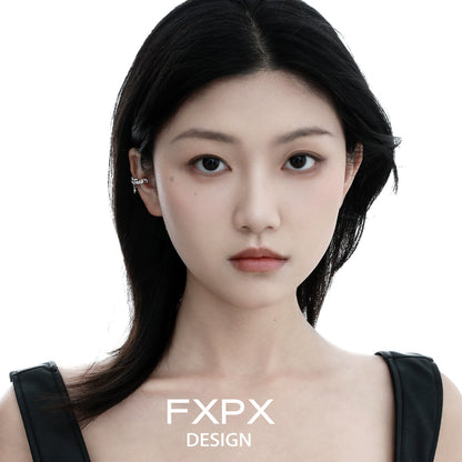 Stylish FXPX red zircon ear clips showcased on a model's ear for a trendy look