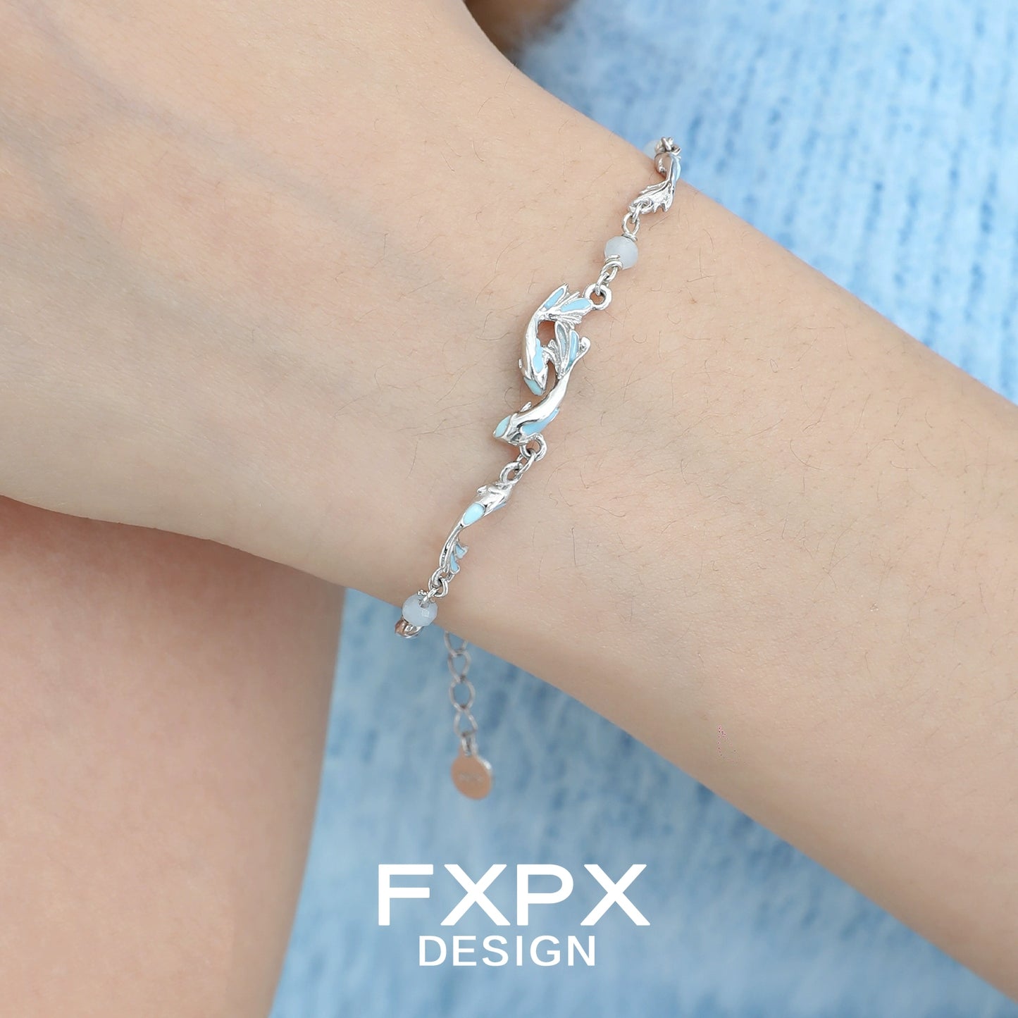 Elegant FXPX sea bluefish beaded bracelet featuring a unique design on a silver chain