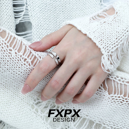 Stylish FXPX secret bond couple rings showcased on a hand wearing a cozy white sweater